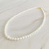 Queen Liz Graduated Pearl Necklace featuring cream-toned graduated pearls from 4mm to 7mm, 18" long with 2" extender.