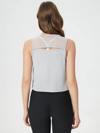 Back view of Millennia Round Neck Cropped Active Tank in light gray, showcasing sheer detailing and highly stretchy fabric.