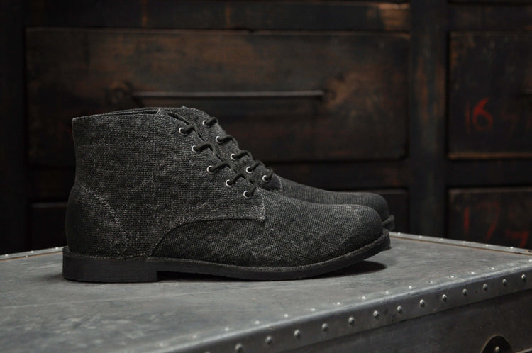 The Grover Vegan Charcoal boot in burnished canvas, showcasing rugged style and lightweight comfort.