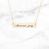 Rose gold bar necklace with the inscription &