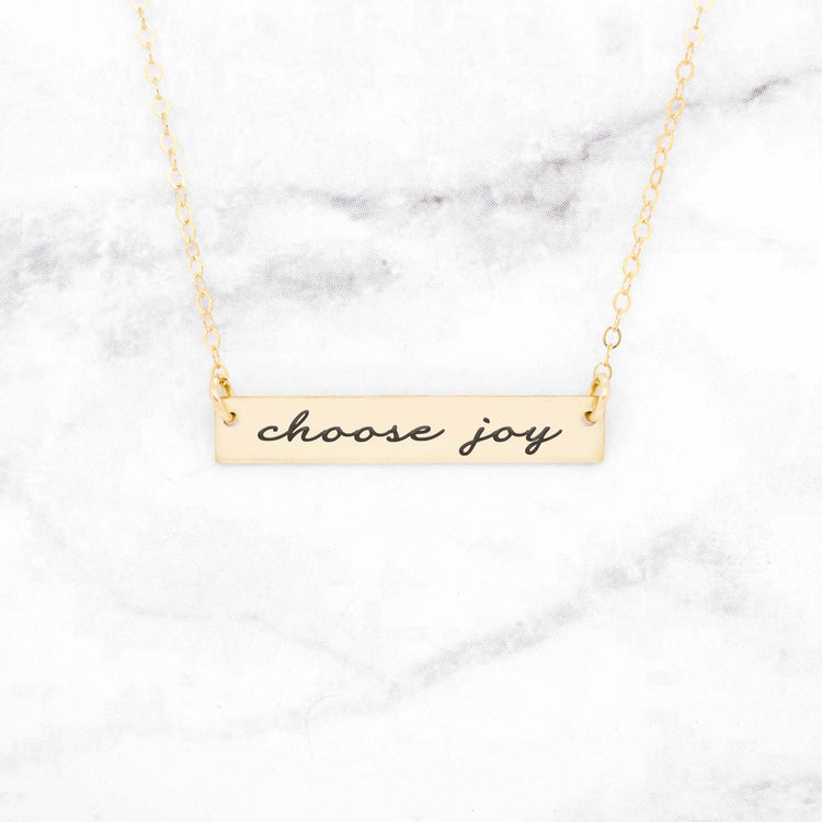 Rose gold bar necklace with the inscription &