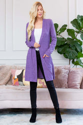 Brushed sweater pocket cardigan in purple, styled over a white top and black jeans, perfect for cold-weather layering.