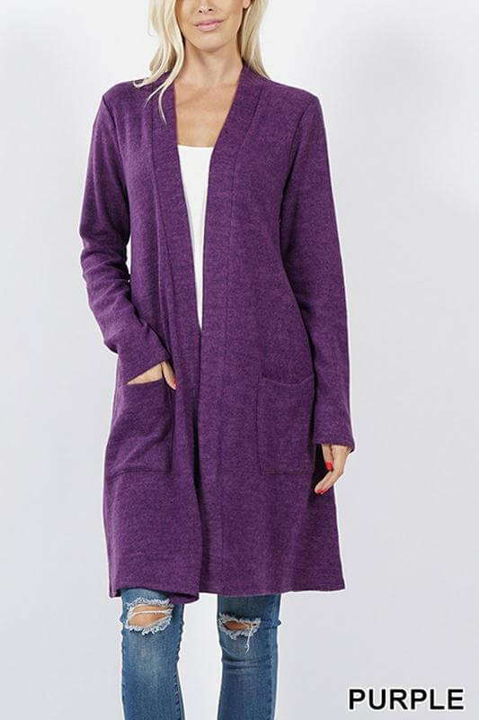 Soft brushed purple cardigan with long sleeves and two pockets, ideal for cold-weather layering.