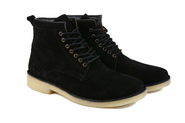 The Hunter black urban hiker boots featuring six eyelets, padded collar, and plantation crepe outsole.