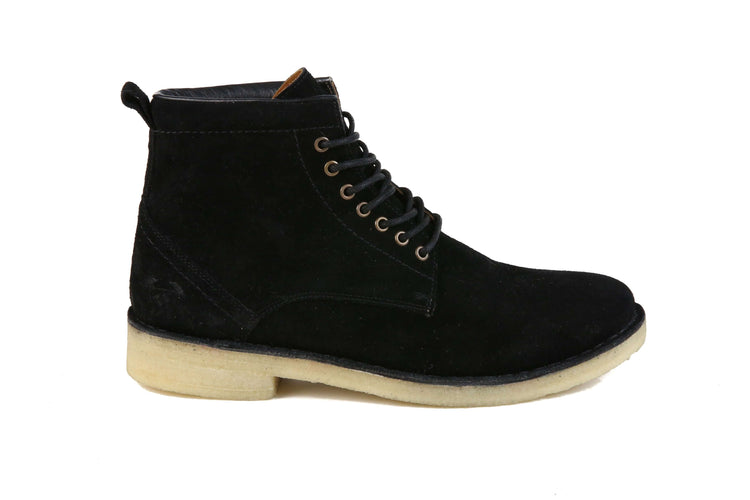 The Hunter black suede urban hiker boot featuring six eyelets, padded collar, and crepe outsole.