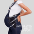 Pregnant woman wearing belly support maternity overalls highlighting integrated belly support features for comfort.