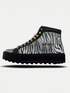 Zebra-print high-top sneakers with vibrant laces, featuring a chunky sole for a trendy look.