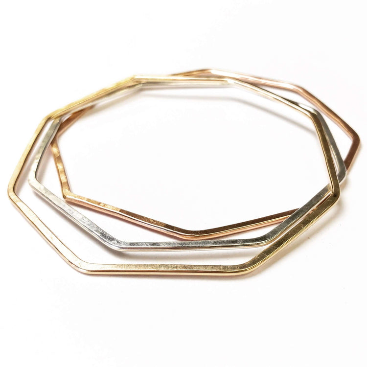 Nash Octagon Bangle set featuring sleek gold, silver, and rose gold colors in a modern octagon design.