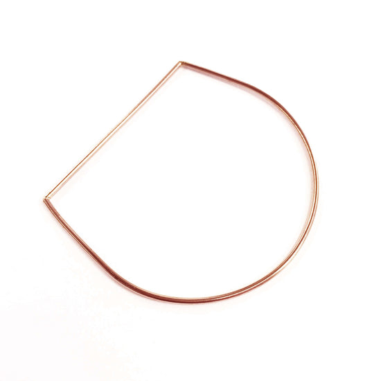 Nikki Bangle, a modern minimalist accessory crafted from high-quality materials, enhancing any outfit.