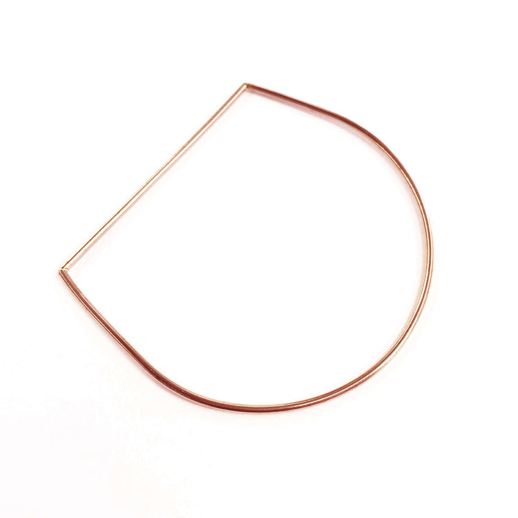 Nikki Bangle, a modern minimalist accessory crafted from high-quality materials, enhancing any outfit.
