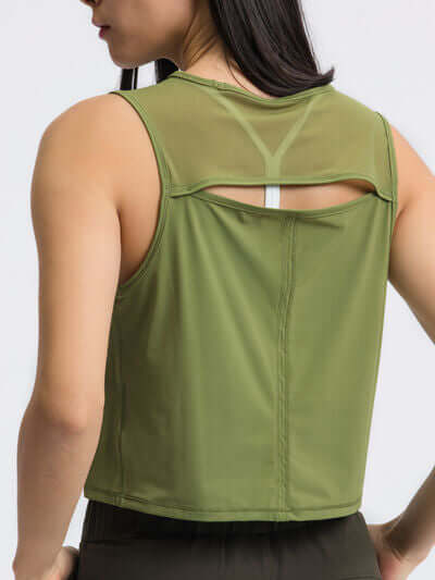 Back view of Millennia Round Neck Cropped Active Tank in olive green, showcasing its sheer panel and cropped design.