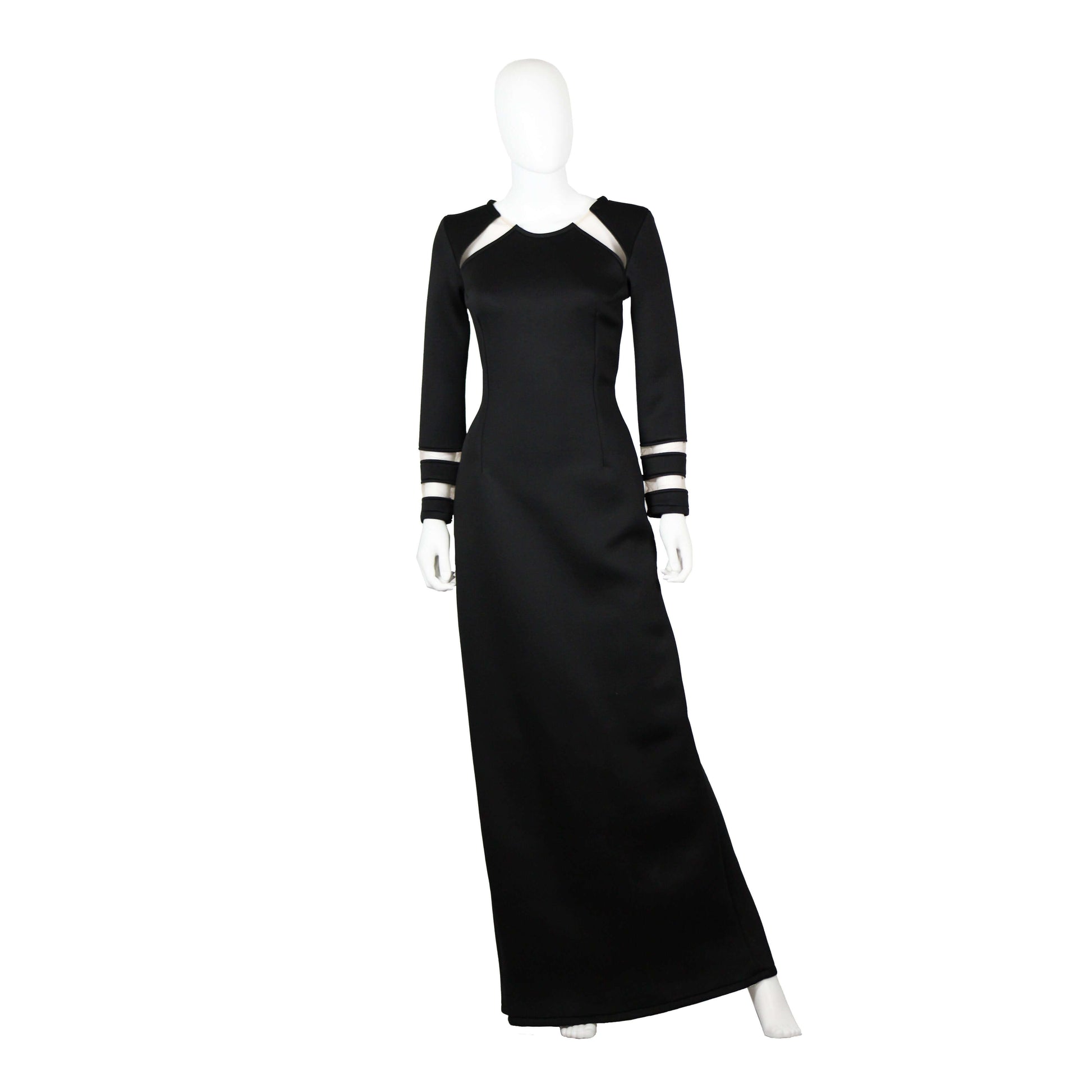 Elegant black evening dress with mesh cutout inserts and long sleeves, perfect for formal occasions.