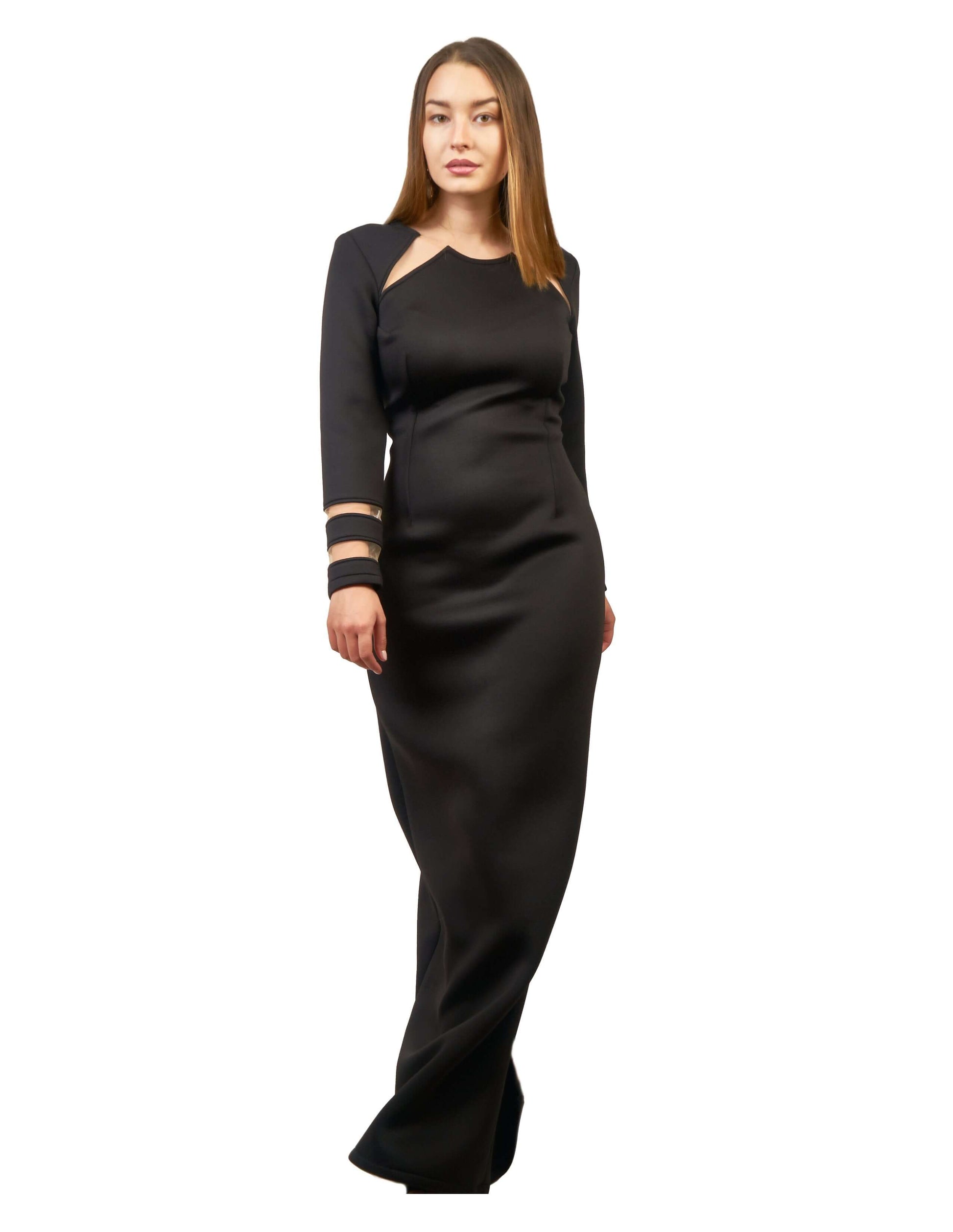 Elegant graphic cutouts evening dress with long sleeves and nude mesh inserts, made of neoprene.