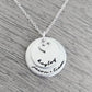 Personalized sterling silver necklace with two discs and heart charm, featuring names Kayley, Jason, and Liam.