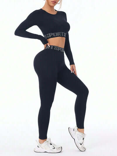 Black letter print round neck long sleeve top and leggings activewear set for women.