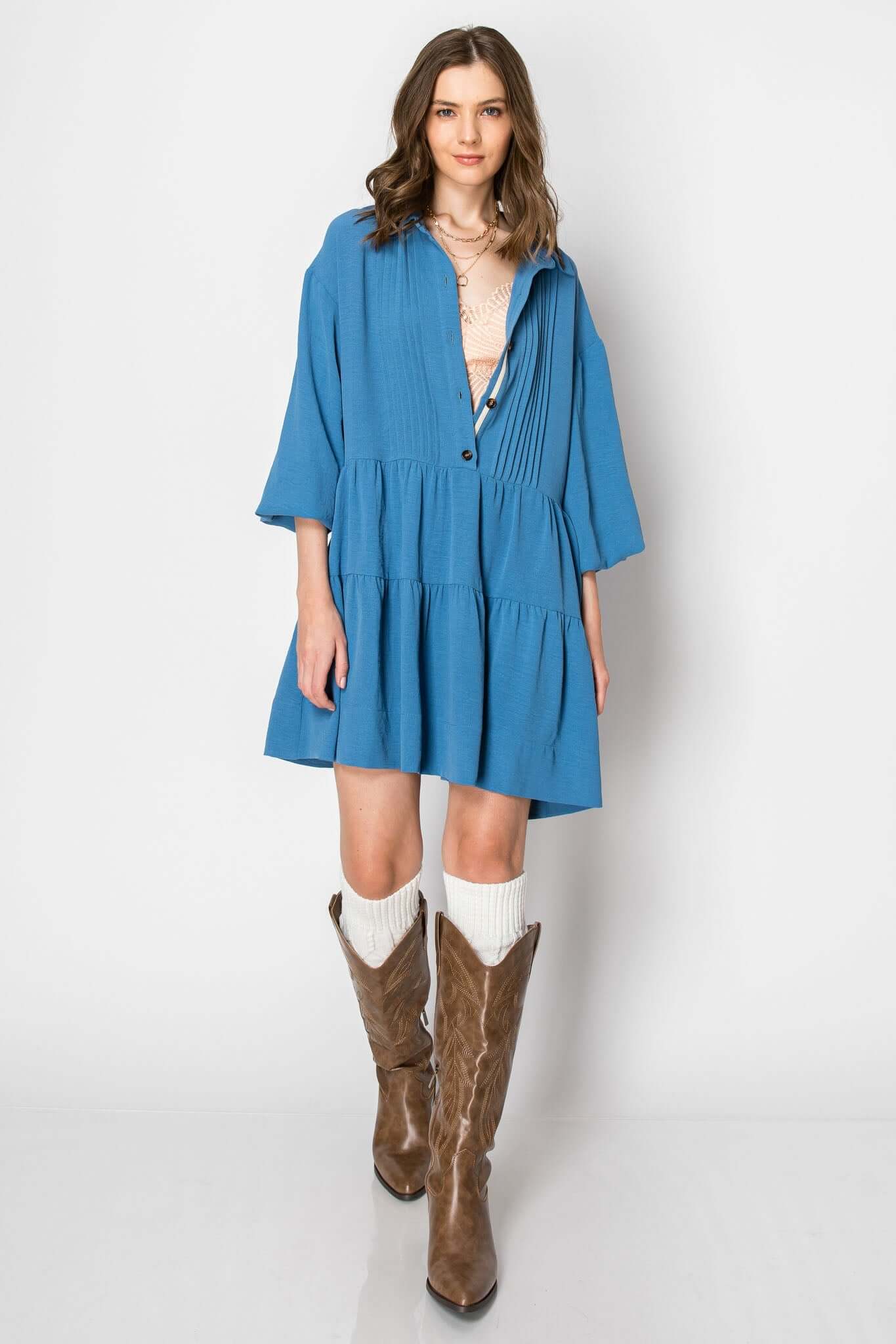 Long Sleeve Collared Button Down Tiered Ruffle Dress in blue, styled with western boots for a casual fall look.