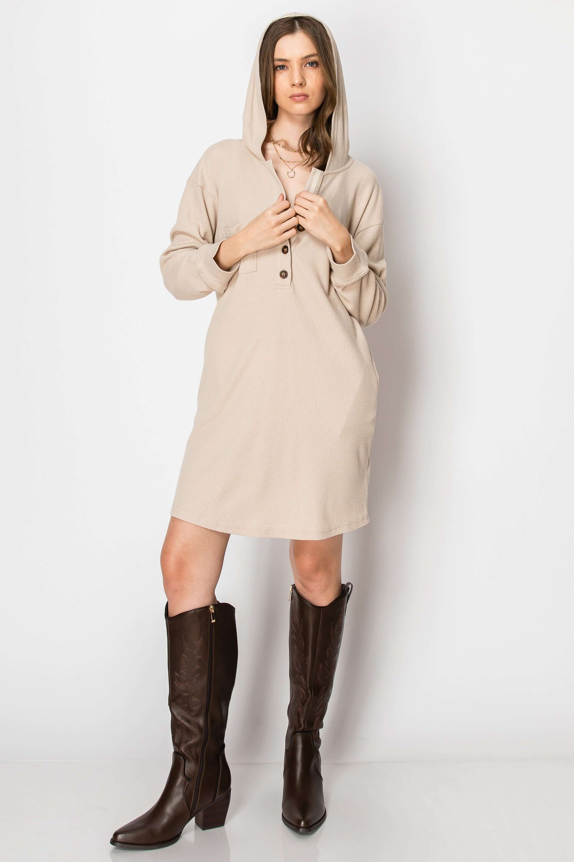 Waffle knit long sleeve button down hoodie dress in beige with pockets, styled for a cozy fall look.