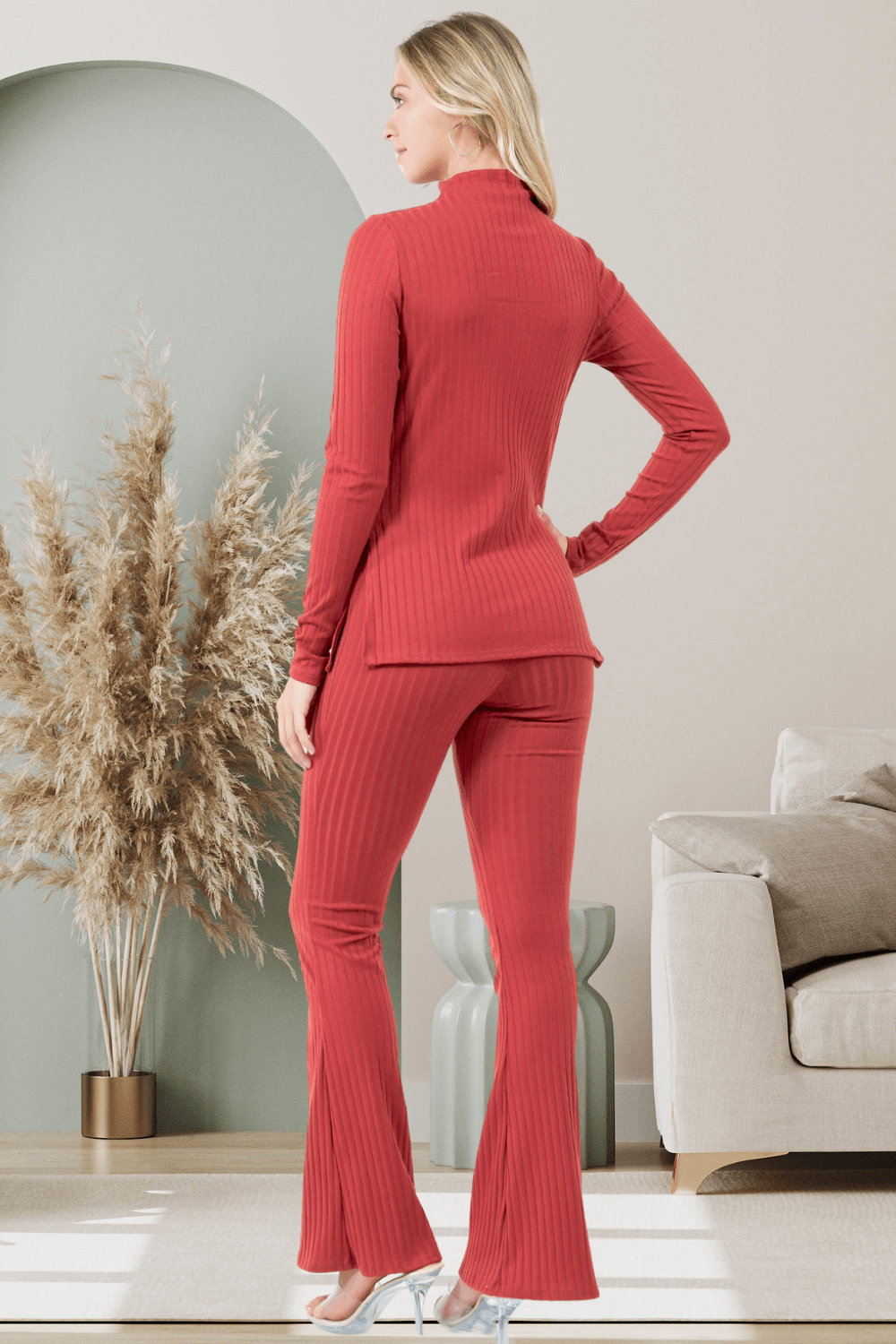 Model wearing the Giana 2pc Flare Pant Set, showcasing the high-neck top and flared pants in a cozy chic style.