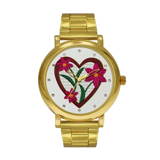 M Milano Expressions gold metal band watch featuring heart/flower dial and analog movement. Ideal for stylish accessory lovers.