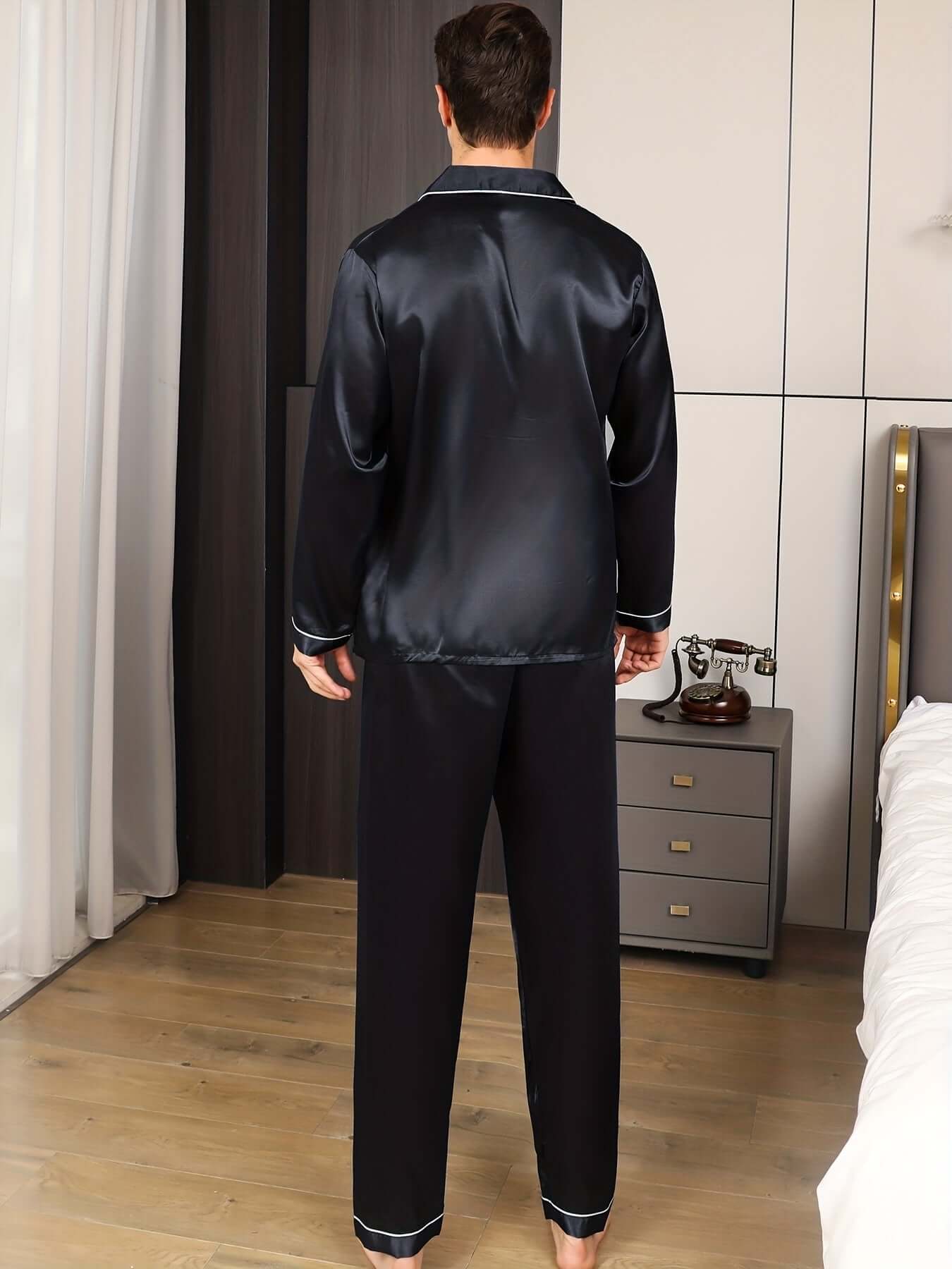 Back view of a man wearing Ultimate Comfort men's ice silk pajama set, showcasing its soft fabric and stylish design.