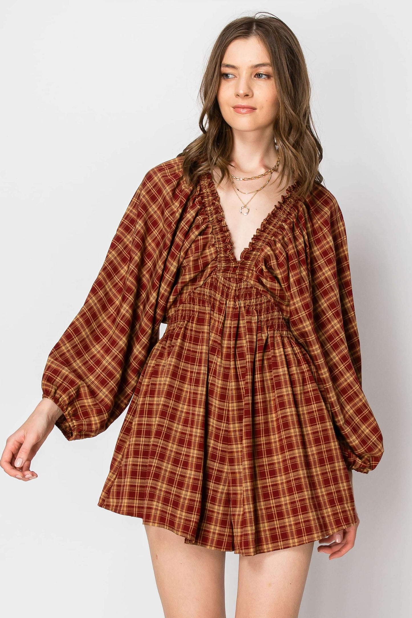 Women’s Dolman Sleeve Plaid Smocked Deep V-Neck Romper with Pockets, perfect for fall vibes and casual wear.