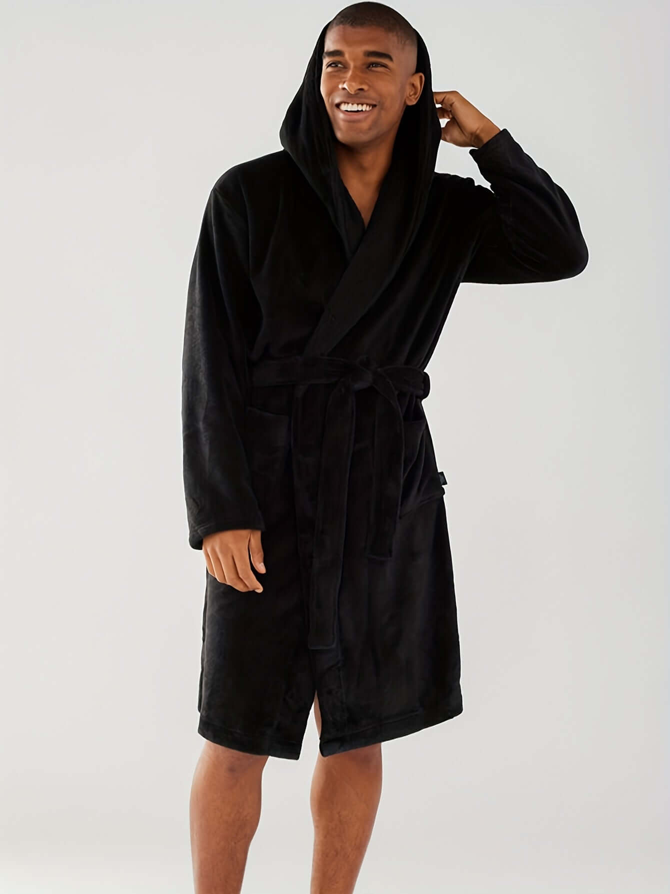 Men's cozy hooded robe in black, perfect for comfortable lounging and post-bath relaxation.