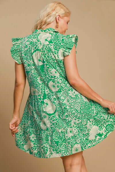 Back view of Umgee plus size green printed ruffle cap sleeve babydoll dress, perfect for casual warm weather outings.