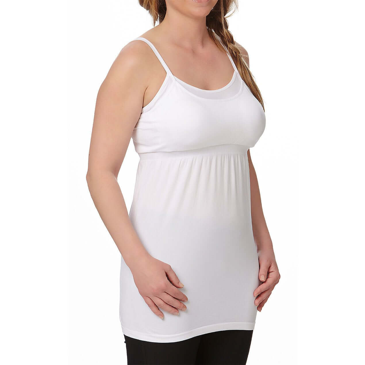 Seamless white nursing camisole with removable pads and adjustable straps for comfort and easy nursing.