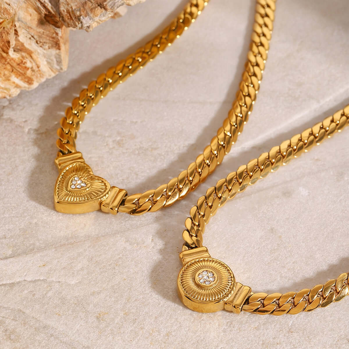 18K gold-plated luxury necklace featuring heart and round diamond-studded pendants, elegant and modern design.