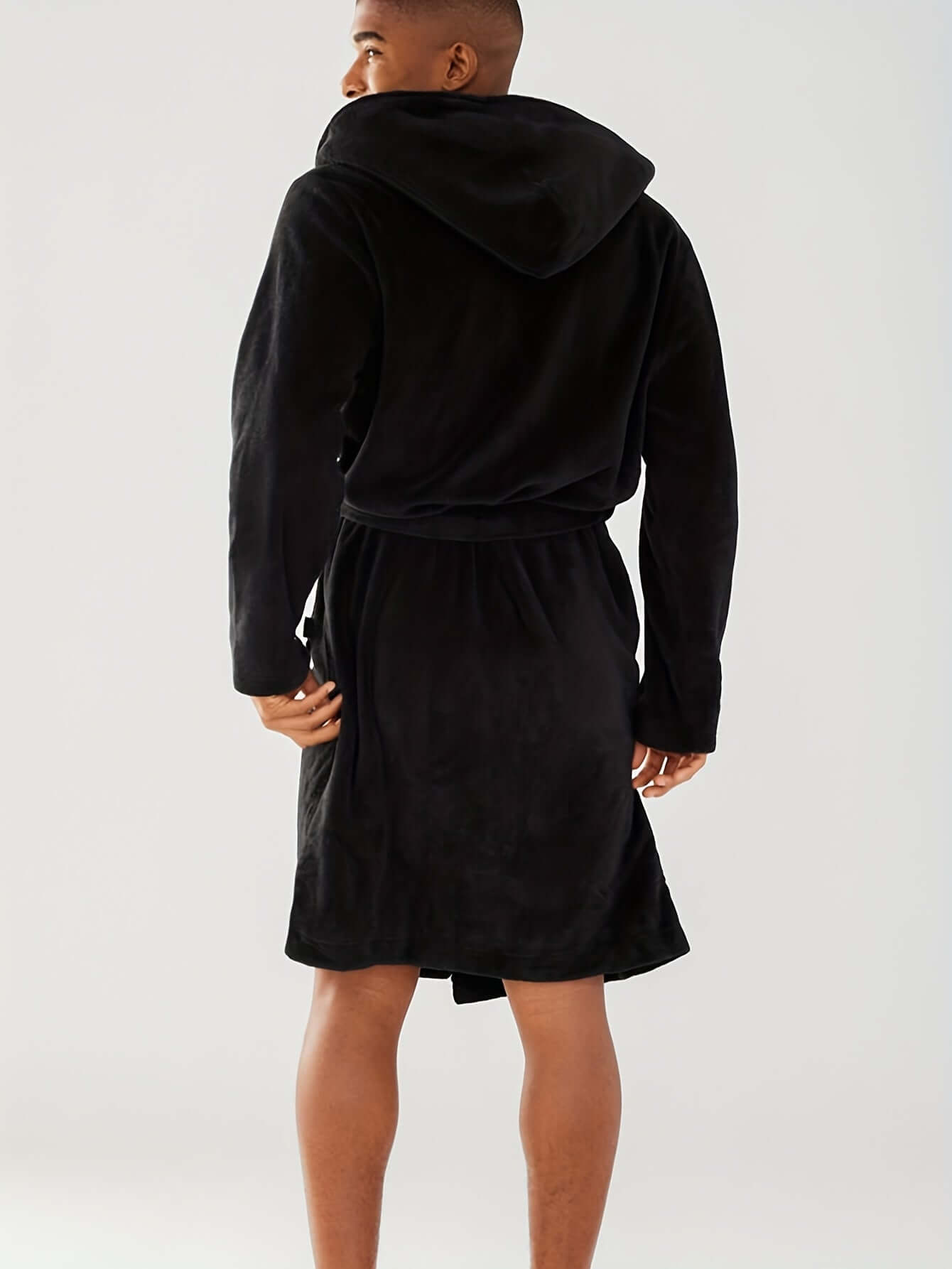 Men's cozy hooded robe in black, showcasing trendy and comfortable lounge wear for relaxing at home.