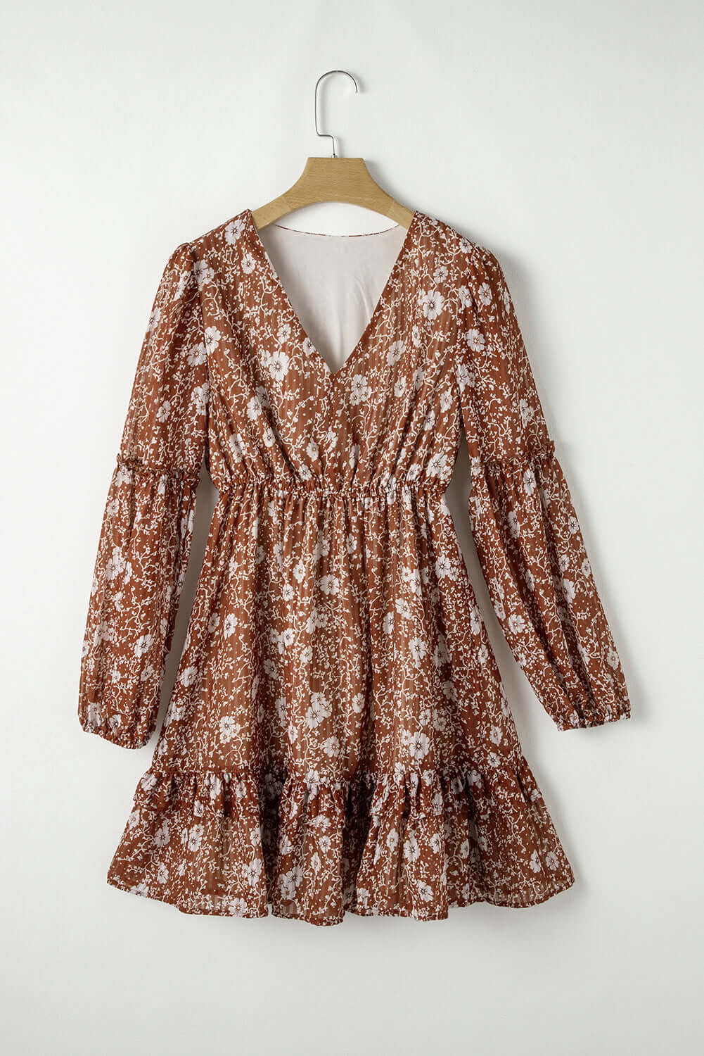 Ashley Boho Floral Puff Sleeve Mini Dress with ruffles and V-neckline in brown and white floral pattern.