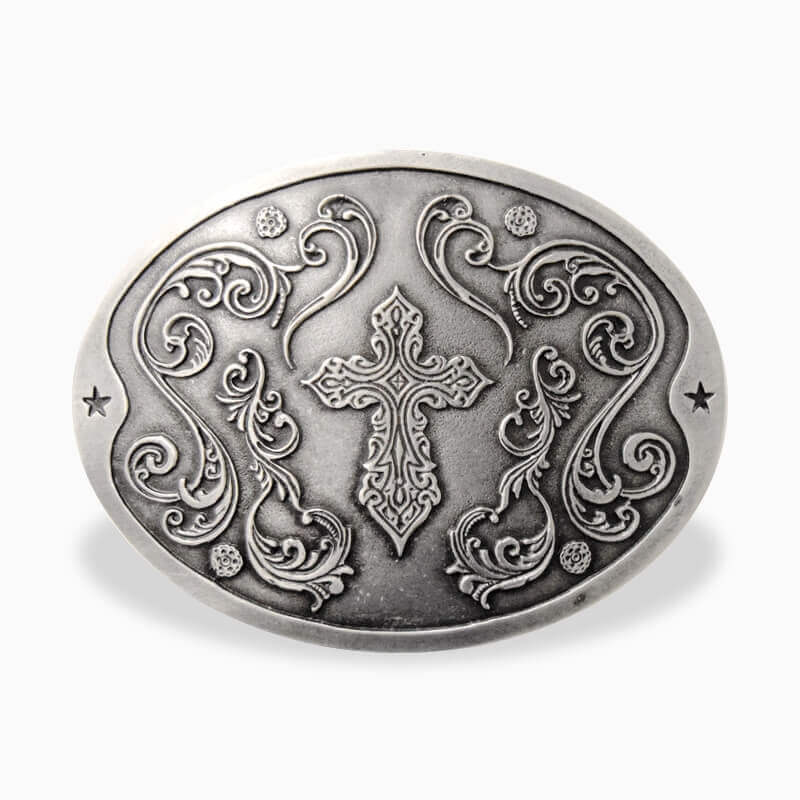 Stylish silver oval cross belt buckle with intricate floral designs, perfect for modern western outfits.