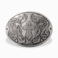 Stylish silver oval cross belt buckle with intricate floral designs, perfect for modern western outfits.