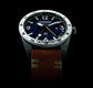 316 grade stainless steel watch with blue dial and rustic brown calfskin strap, featuring GMT function.