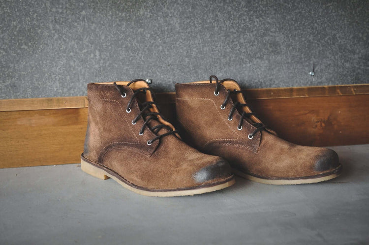 Burnished tobacco suede desert boots with 5 eyelets, perfect for casual outings and stylish comfort.