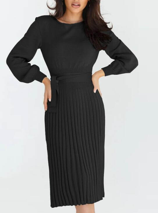 Women's slim pleated black mid-length sweater dress with long sleeves, perfect for autumn-winter casual styling.