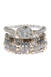 Natural stone charm mixed beads bracelets featuring various textures and colors, perfect for stacking.