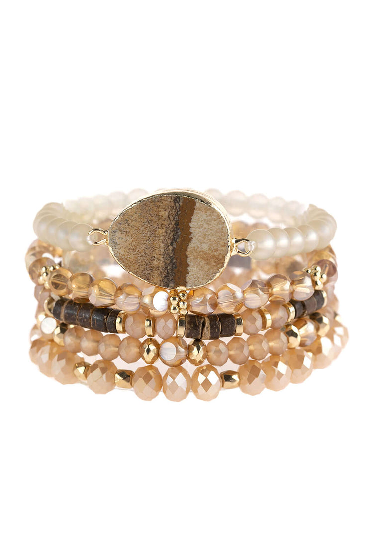Natural stone charm mixed beads bracelets featuring ornate etching and stretchable design for versatile styling.
