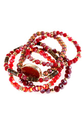 Natural stone charm mixed beads bracelets in vibrant red tones with intricate details and charms, stretchable design.