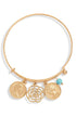 Multi Charm Bangle featuring gold coins and a flower charm, with turquoise bead, stylish and unique accessory.