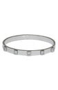 Glamorous silver crystal bangle with CZ crystal settings, perfect elegant accessory for any outfit.