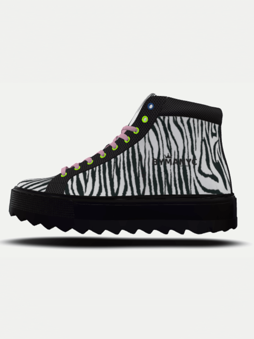 Zebra-print high-top sneakers with vibrant laces, featuring a chunky sole for a trendy look.