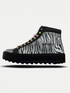 Zebra-print high-top sneakers with vibrant laces, featuring a chunky sole for a trendy look.