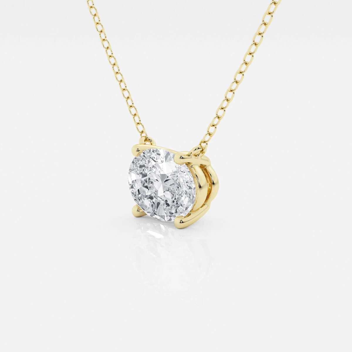 1.00 Ctw oval lab-grown diamond solitaire pendant in 14K yellow gold chain, ethically sourced and AGI certified.