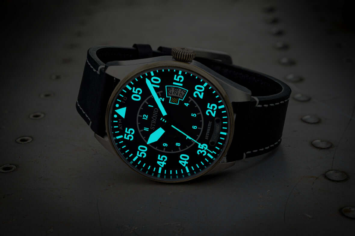 STROND DC-4 automatic watch with luminous black dial, showcasing bold luminous markers and hands, limited edition timepiece.