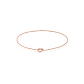 Shelby Love Knot Bangle in rose gold, featuring a unique knot design for a stylish and elegant accessory.