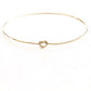 Shelby Love Knot Bangle showcasing elegant design with a unique love knot, perfect for enhancing any outfit.