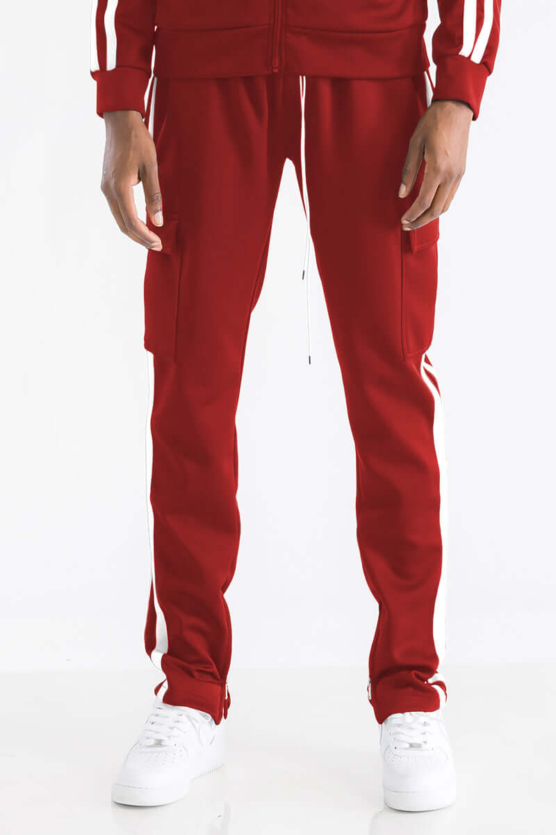 Two Stripe Cargo Track Pant in red, featuring Velcro closure pockets and ankle zippers for a slim fit style.