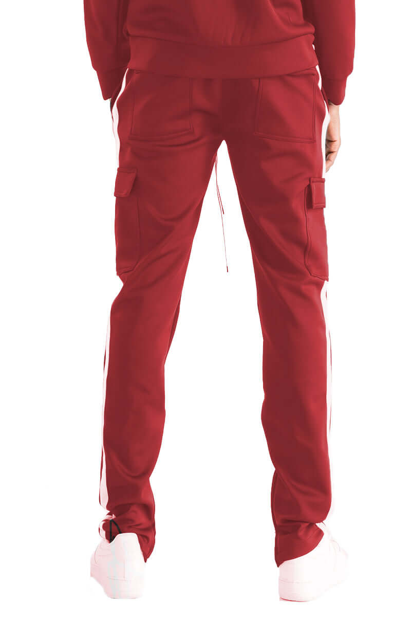 Red Two Stripe Cargo Track Pants with Velcro pockets and ankle zippers, designed for a slim fit and comfort.