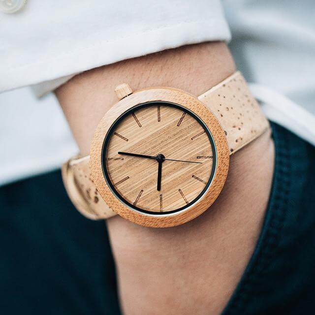 Eco-friendly Panda Watch features bamboo and cork design with minimalist Swiss Movement face.